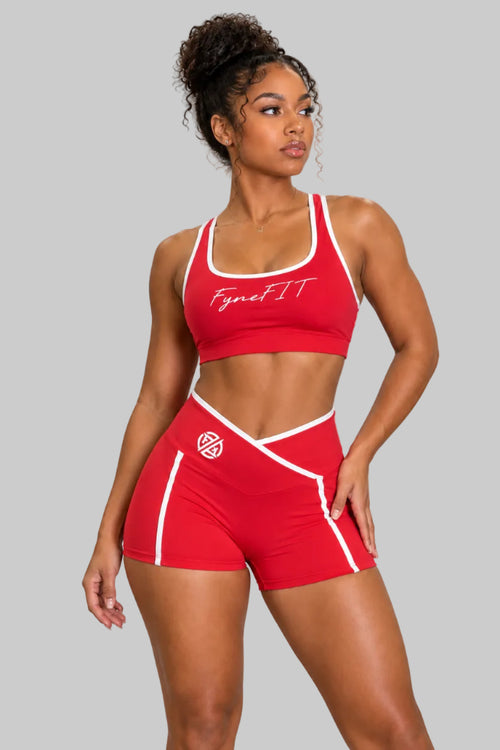 FyneFIT Double Take Block Yoga Sports Bra showing a stylish black and white colorblock design, ideal for active yoga workouts.