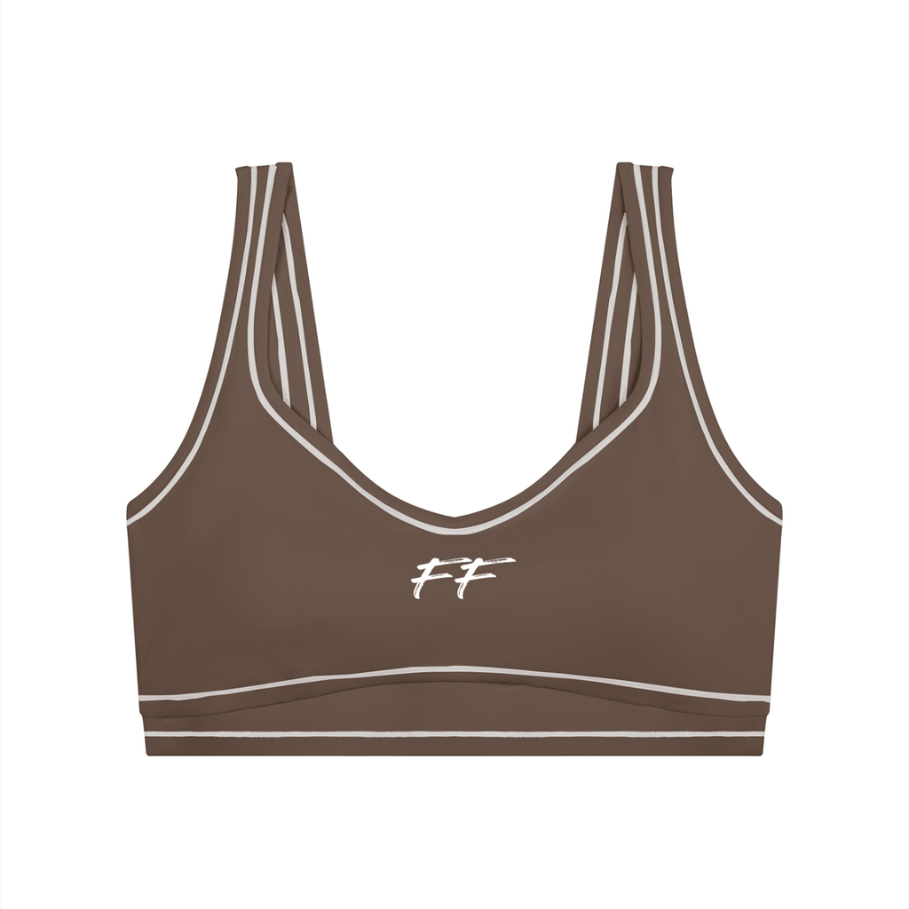 Brown nylon blend yoga sports bra with white contrast edges and logo featuring Double Take Topstitching detail.