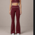 Double Take High Rise flared yoga pants in burgundy with white contrast piping and a high waistband for a flattering fit.
