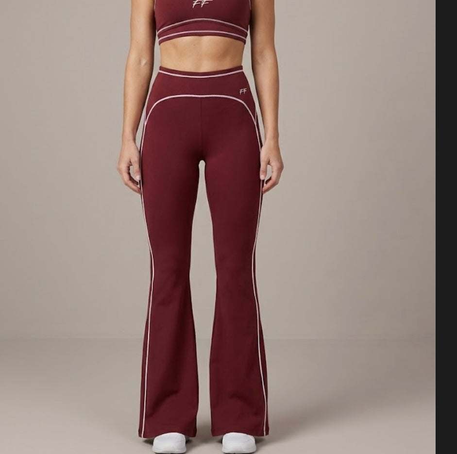 Double Take High Rise flared yoga pants in burgundy with white contrast piping and a high waistband for a flattering fit.
