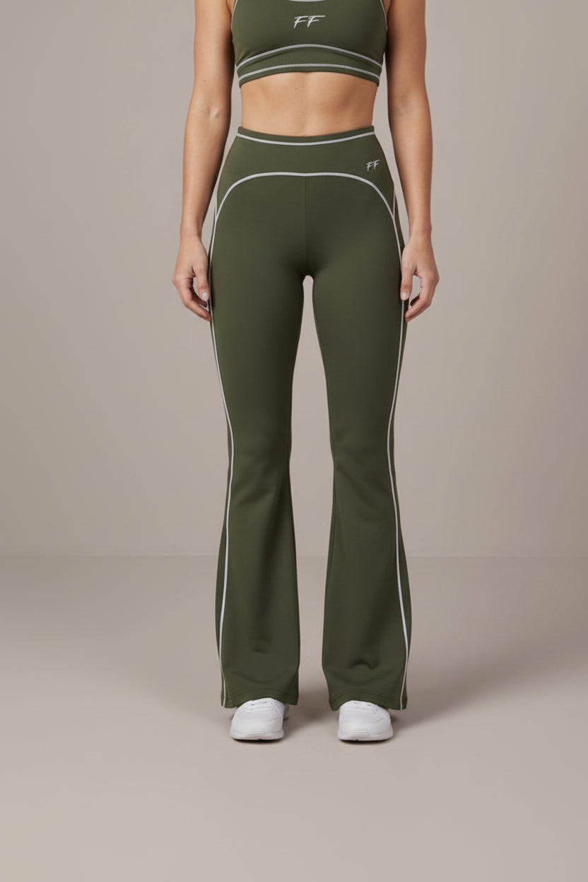 ODMPOD Double Take high-rise flared yoga pants shown on a model, featuring a fitted waist and flared leg design.