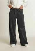 Vintage washed waist pants by FyneFIT, featuring relaxed fit and faded denim texture in a casual style.