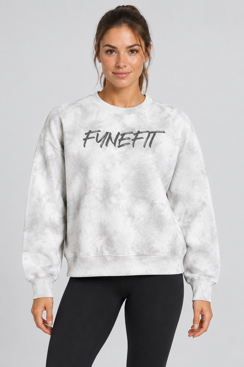 Female model wearing the washed FYNEFIT sweatshirt