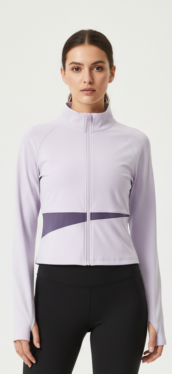 Fitness model wearing FyneFIT light purple and deep purple paneled yoga jacket on a plain studio background