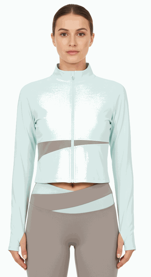 Model in mint jacket zipped with taupe leggings