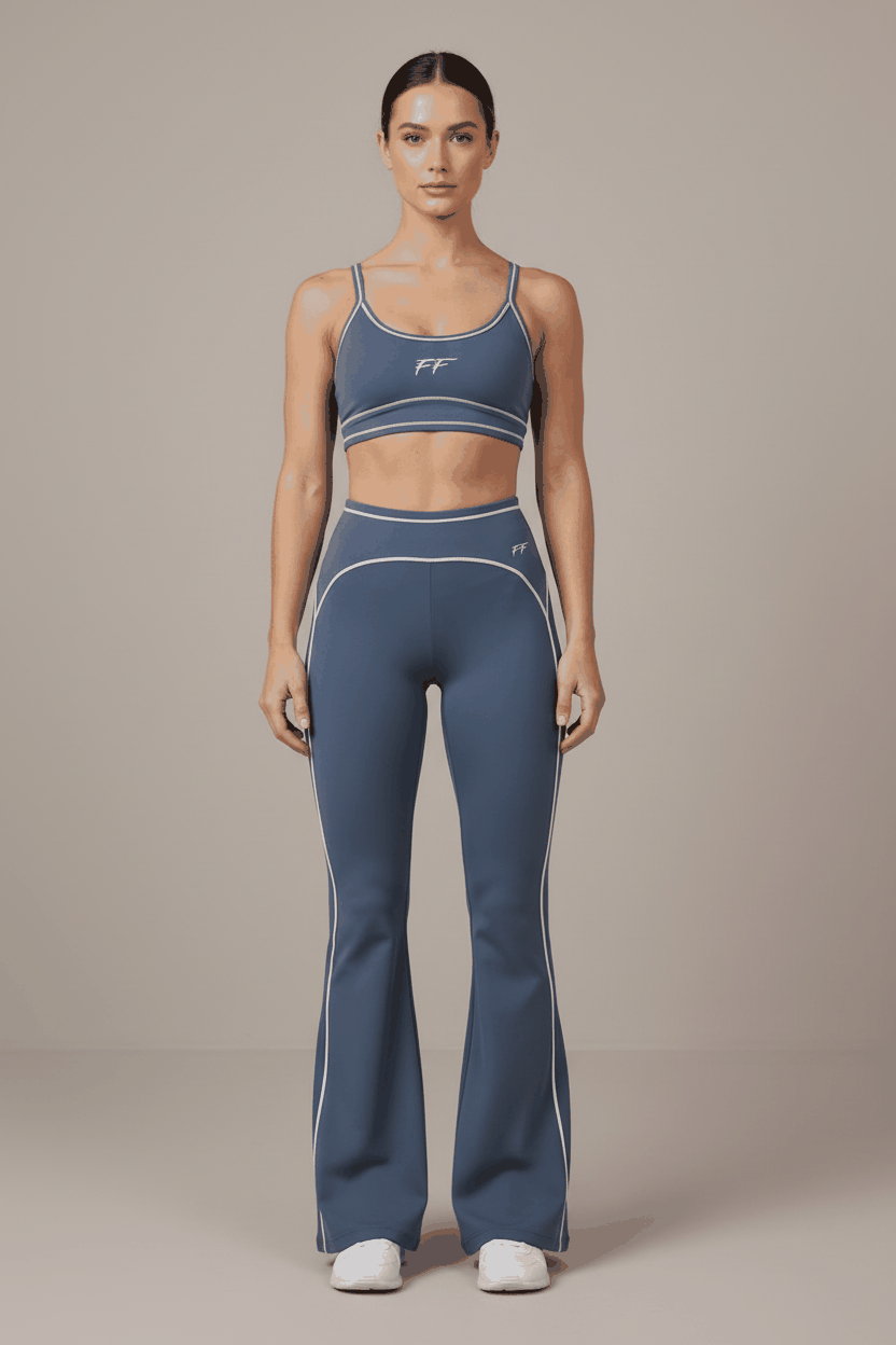 Double Take High Rise flared yoga pants in blue with white piping, high waist, and stretchy fabric blend.